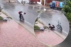 Hành động nhỏ của cậu học trò dưới cơn mưa khiến người lớn phải suy nghĩ