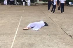 Bức ảnh nữ sinh nằm giữa sân trường khiến CĐM bất ngờ, lý do sau đó khiến ai cũng 'ngã ngửa' bất ngờ