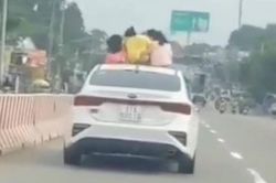 Cho 3 trẻ nhỏ ngồi trên nóc ô tô lao đi vun vút, chủ nhân chiếc xe là ai?