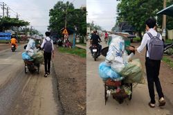 Hình ảnh nam sinh phụ đẩy xe phế liệu cho ông lão trên đường khiến nhiều người rưng rưng