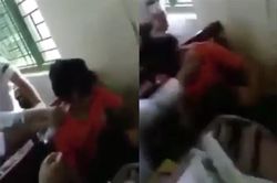 Nữ sinh lớp 7 bị bạn túm tóc tát, vẩy nước vào mặt ngay trong lớp học