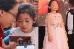 Con gái Mai Phương rạng rỡ, xinh xắn trong lễ bế giảng, luôn có bà nội kề bên chăm sóc