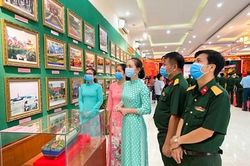 Triển lãm 'LLVT Quân khu 7-Tự hào vững bước dưới cờ Đảng'