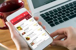 Factors affect consumers' decision on food consumption via mobile applications: An empirical case of GrabFood Delivery App