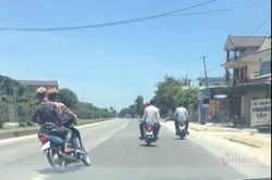 Quái xế kẹp ba, đầu trần 'đánh võng' trên QL1A ở Nghệ An
