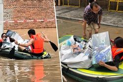 Nước lụt ngập nhà, vợ bơi về phá cửa sổ để cứu bộ sưu tập người máy Gundam cho chồng