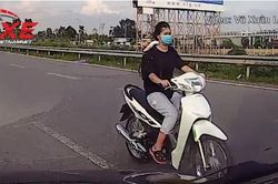 Cô gái trẻ phóng xe máy ngược chiều trên cao tốc Hà Nội - Bắc Giang
