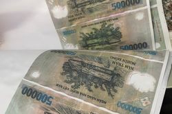 Bắt 2 nghi phạm sản xuất tiền giả