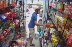 Vờ hỏi mua bia, người đàn ông trộm hộp thẻ điện thoại