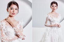 Á hậu Thùy Dung mặc váy cưới đính lông vũ, hóa 'thiên nga trắng' khi làm vedette sàn diễn