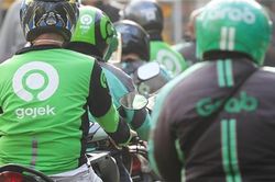 Grab và Gojek được thúc ép để sáp nhập
