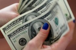 Đồng USD vẫn xuống giá dù ai thắng cử Tổng thống