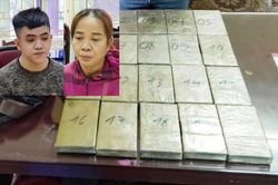 Người đàn bà vận chuyển 20 bánh ma túy trong túi xách