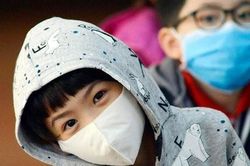 Giữ ấm cho con khi đến trường ngày rét đậm