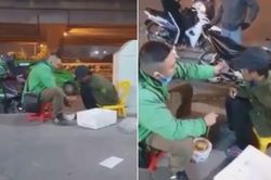 Thấy người đàn ông lang thang ngồi co ro bên vỉa hè, tài xế xe công nghệ có hành động ấm lòng