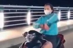 Phạt cô gái đầu trần phóng xe như bay, 'múa quạt' trên đường
