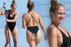 Jennifer Lopez nóng bỏng lướt ván trên biển