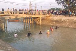 Hàng chục người lội sông lạnh buốt tìm kiếm bé trai 9 tuổi
