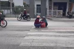 Bức ảnh hai người phụ nữ ngang nhiên ngồi nói chuyện giữa đường khiến cư dân mạng 'dở khóc dở cười'