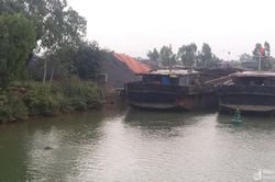 Thi thể cụ bà trên sông Mai Giang
