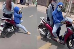Nữ 'ninja' chở bạn trên xe máy 'làm xiếc' trên đường