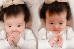 Hết bị trêu là má bánh bao, 'thế lực nhí' 5 tháng tuổi của Đông Nhi lại bị lôi ra làm mẫu tóc cho mẹ