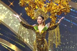 Ngọc Thảo mặc 'Lá ngọc cành vàng' nặng 30 kg, tỏa sáng trên sân khấu Miss Grand