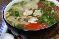 Công thức làm canh trai nấu dưa chua cực ngon dành cho mùa hè