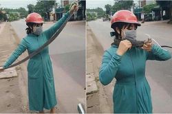 Cô nàng quấn rắn quanh cổ khiến dân mạng khiếp sợ: 'Quay xe vào chợ mua sả và lá lốt về làm chả'