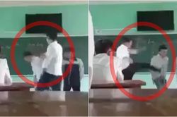 Phẫn nộ thầy giáo buông lời thô tục, liên tiếp tát mạnh vào đầu rồi đá thẳng vào học sinh giữa bục giảng