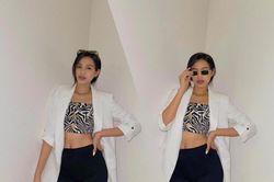 Hoa hậu Đỗ Thị Hà lên đồ năng động, khoe eo thon thả ra hành lang tạo dáng sành điệu