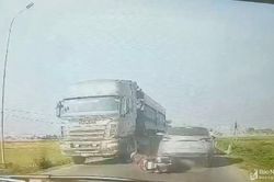 'Rụng tim' khi xem clip nam thanh niên thoát chết dưới gầm xe đầu kéo