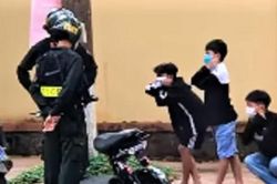 Xôn xao Clip cảnh sát phạt ba học sinh 'thụt xì dầu'
