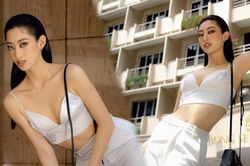 Hoa hậu Lương Thùy Linh khoe eo thon, ngực đầy trong loạt trang phục trắng tinh khiết
