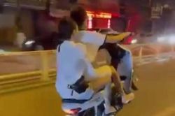 Lào Cai: Triệu tập đôi nam nữ bốc đầu xe máy di chuyển trên đường Hoàng Liên