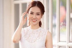 Nhan sắc vợ trẻ làm báo của NSND Công Lý