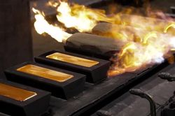 Giá vàng nhảy vọt lên đỉnh 4 tuần sau phát biểu của ông Powell