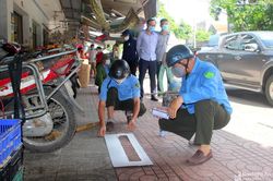 TP. Vinh kẻ vạch giới hạn khu vực bán hàng trước cổng chợ đầu mối