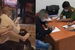 Đôi nam nữ điều khiển xe máy bằng... chân bị phạt 9,2 triệu đồng