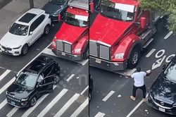 Bị thốc còi, tài xế xe SUV có hành động khiến lái xe đầu kéo 'phát điên'