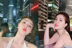 Bảo Thy khoe ảnh bơi đêm cực sang chảnh nhưng ông xã lấp ló phía sau mới 'chiếm spotlight'