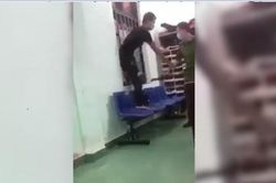 Đình chỉ công an dùng dùi cui điện dí vào nam thanh niên đang bị còng
