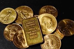 Vàng giảm giá vì nhà đầu tư tin Fed sắp thắt chặt chính sách