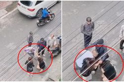 Người đàn ông đánh đập, đá tới tấp vào mặt một phụ nữ, bắt quỳ gối giữa đường vì 'mày dám chửi vợ tao à?'