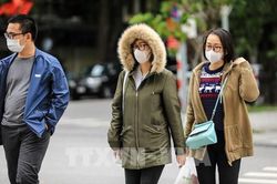 Hình ảnh người dân Hà Nội đón không khí lạnh đầu mùa