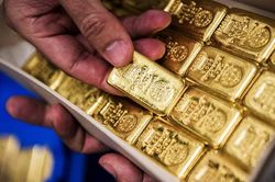 Giá vàng thế giới 27/10: Giảm 1,5% khi đồng đô la tăng giá