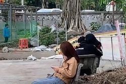Clip: Cặp đôi thản nhiên ôm hôn trong chùa, bất chấp xung quanh có trẻ con