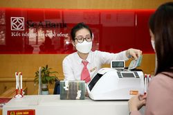 Sớm luật hóa để xử lý nợ xấu ngân hàng