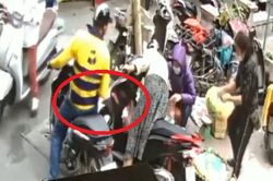 Clip: Nam thanh niên mặc áo xe ôm công nghệ nhanh tay 'thó' ví tiền của người phụ nữ