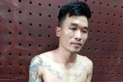 Bí ẩn hình xăm trên ngực kẻ dùng dao cướp tại cửa hàng Circle K ở Hà Đông